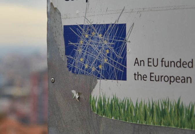 MITROVICA, KOSOVO - OCTOBER 24: A board promoting the construction of a park funded by the European Union is seen vandalized in North Mitrovica on the Kosovo Serb side on October 24, 2020 in Mitrovica, Kosovo. (Photo by Pierre Crom/Getty Images)