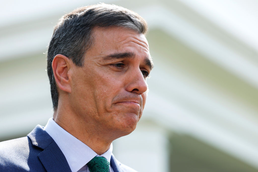 Thousands of spectators burst into song to mock Spain's leader in the country's Pamplona bullring during the traditional week-long San Fermín celebrations that began on July 6. (Photo by Anna Moneymaker/Getty Images)