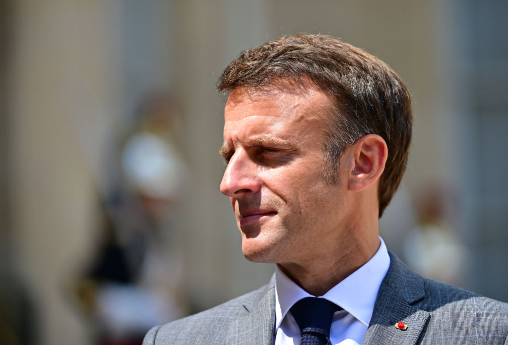 President Emmanuel Macron is fighting to keep a small island territory from seceding from France. (Photo by Christian Liewig - Corbis/Getty Images)