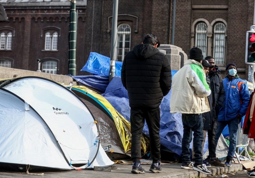 Migrants have declared they will ignore a court order to abandon their squat in the centre of Brussels. (EPA-EFE/STEPHANIE LECOCQ)