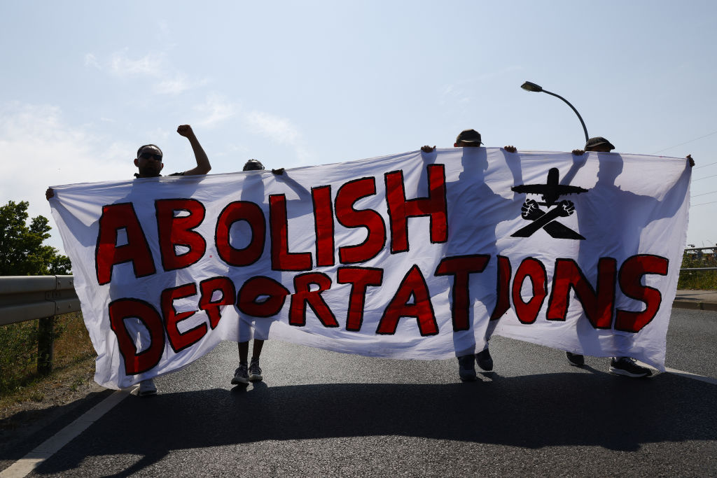 Germany should stop handing cash to migrants claiming asylum in the country, one of the parties that make up the country's ruling coalition has said. (Photo by Michele Tantussi/Getty Images)