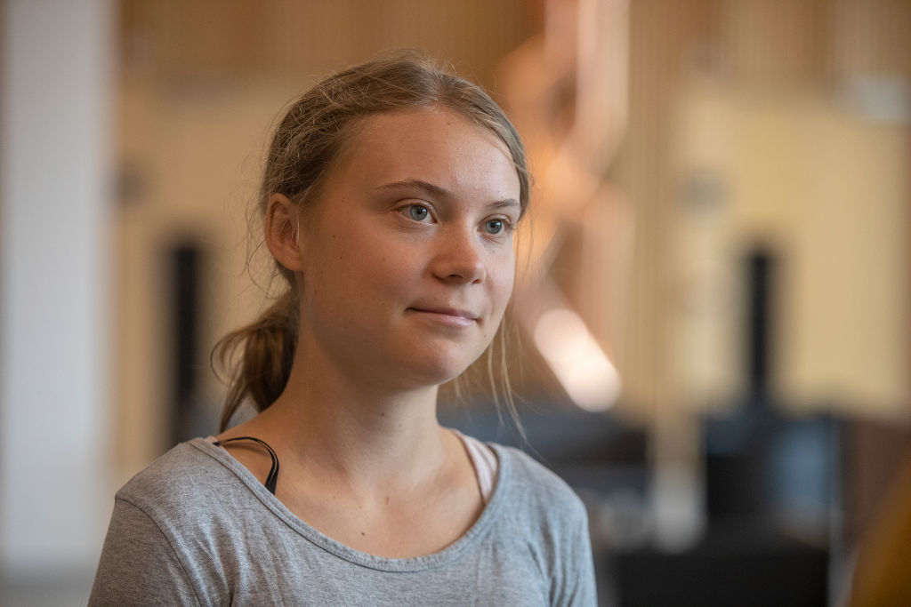 Swedish climate activist Greta Thunberg was charged with disobeying a police order on Friday, less than two months after she was convicted and fined for the same offence. (Photo by Ole Jensen/Getty Images)