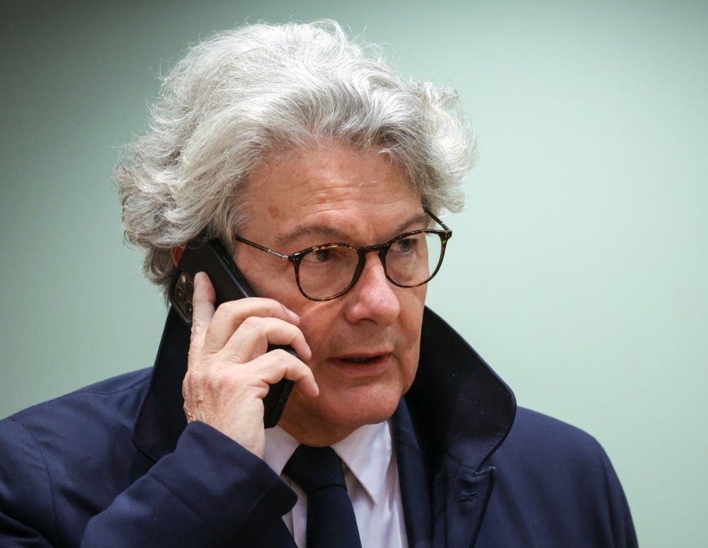 The European Union has launched a preliminary investigation into Elon Musk's X -- formerly Twitter - over claims it allowed "hate speech" and other forms of "illegal content" on the site. (EPA-EFE/OLIVIER HOSLET)