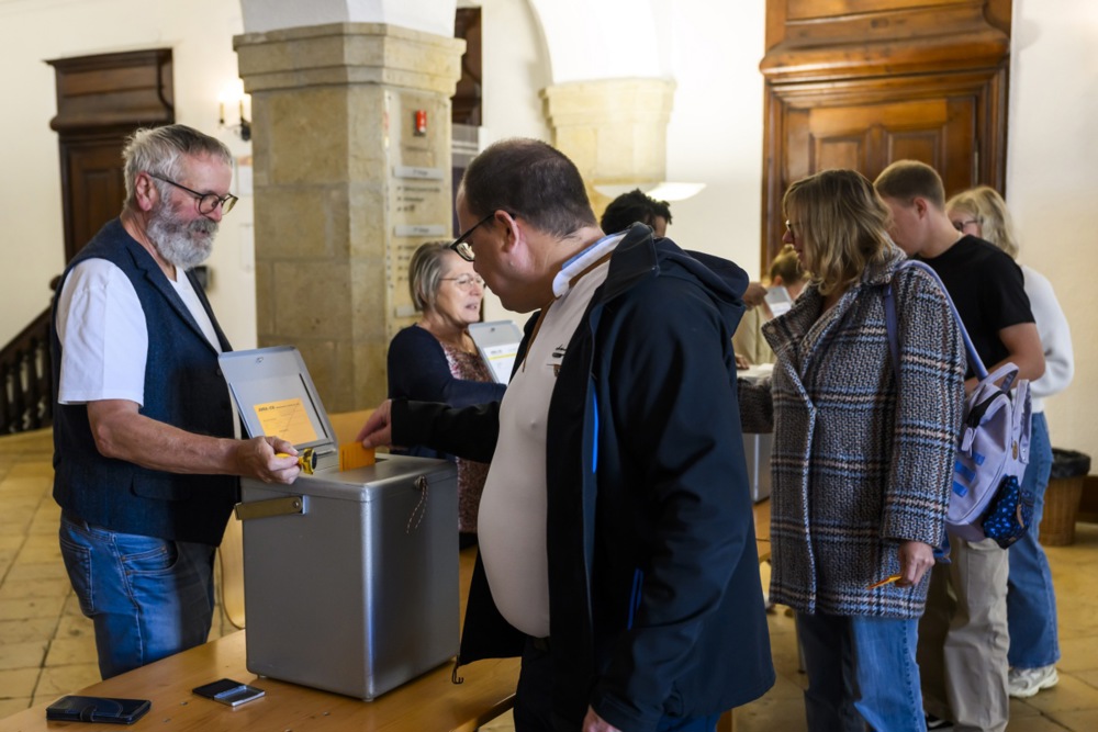 Switzerland’s right-wing People’s Party scored one of its best results ever in national elections, reaping the rewards of a campaign that leveraged concerns over immigration. (EPA-EFE/JEAN-CHRISTOPHE BOTT)