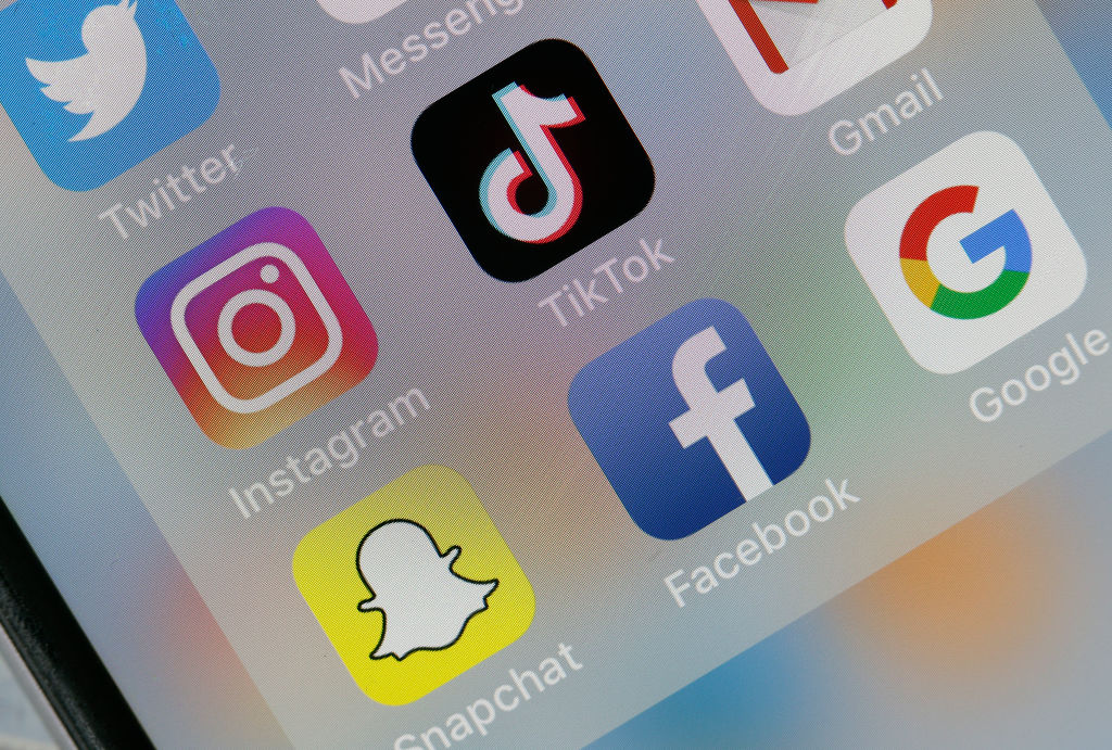 Meta -- the owner of Facebook and Instagram -- and TikTok have both insisted that they are not blocking or limiting the spread of pro-Palestine content. (Photo by Chesnot/Getty Images)