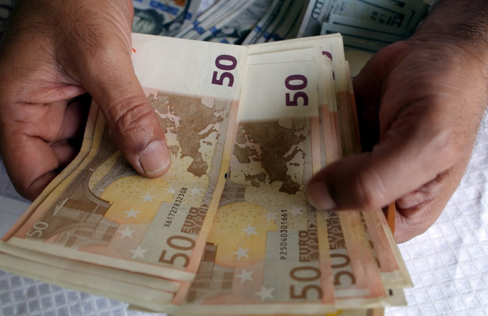 Austria is required to get the permission of the European Union before it passes any laws regulating the use of cash in the country, the Commission has claimed. (EPA/KHALED ELFIQI)