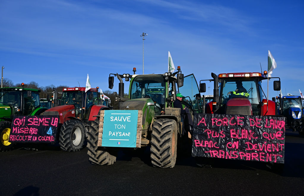 Farmers in France have begun a "siege of Paris" after the country's government failed to roll back various green restrictions on the agriculture sector. (Christian Liewig - Corbis/Getty Images)