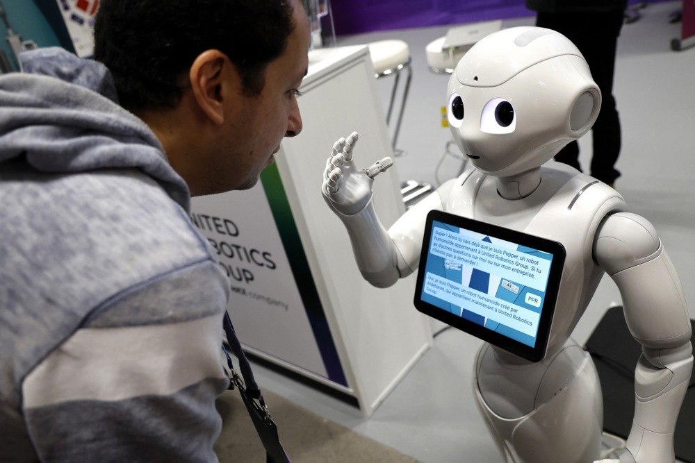 French authorities must pump €5 billion into AI development each year for the next five years if it wants to be competitive in the sector at the global level, a government report has found. EPA-EFE/SEBASTIEN NOGIER