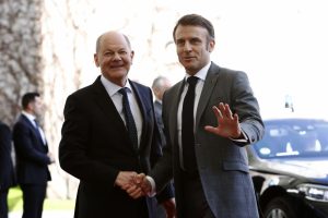 German Chancellor Olaf Scholz and French President Emmanuel Macron are advocating for a "rebalancing" of trade between Europe and China amid Berlin's efforts to woo the Beijing government. (Photo by Michele Tantussi/Getty Images)