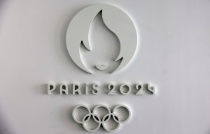 French labor unions have expressed discontent over the 45,000 volunteer workers scheduled for the Paris Olympics, labeling it as "disguised employment. (Photo by Chesnot/Getty Images)