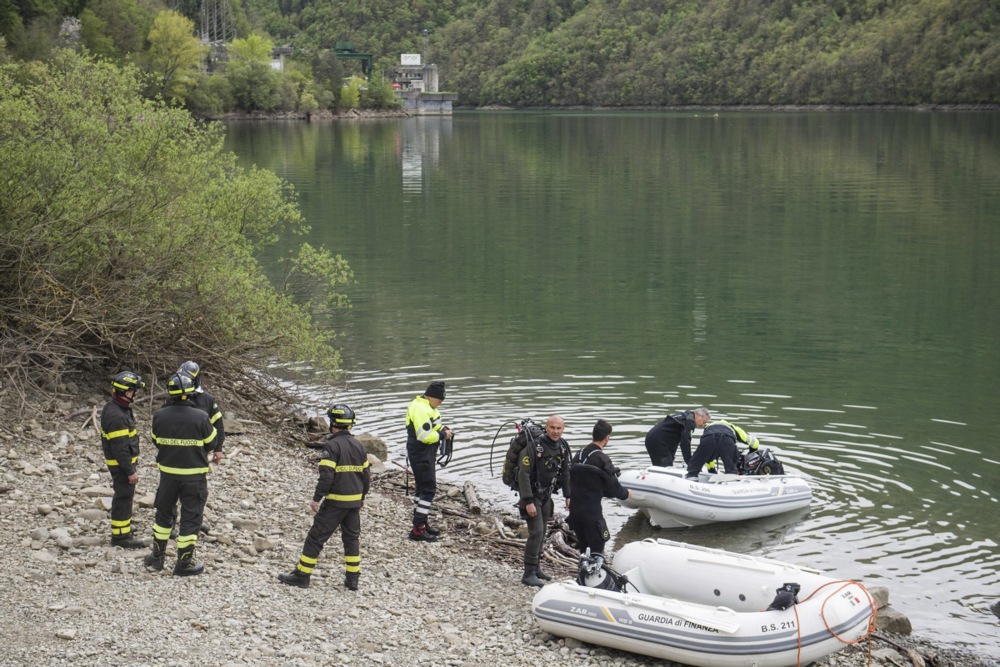 Rescuers have recovered the last two bodies from Lake Suviana following an explosion at the hydroelectric plant at Bargi, Italy. (EPA/MICHELE LAPINI)