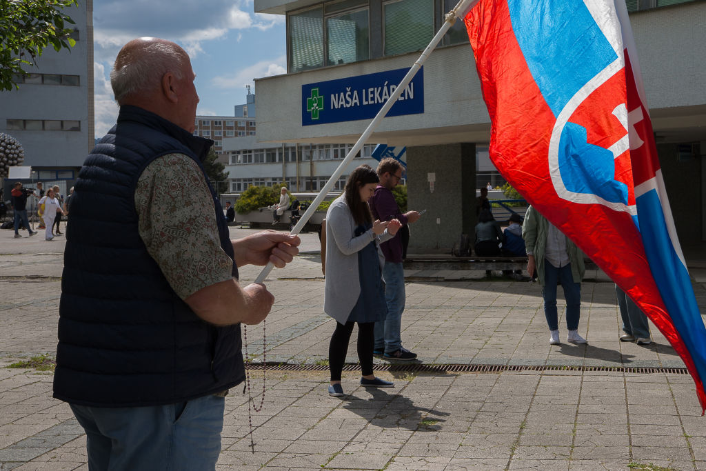 Slovak Prime Minister Robert Fico is said to be "between life and death" after an attempt on his life earlier this week, with media in the country now accusing senior government officials of trying to use the incident to "polarise" society. (Photo by Zuzana Gogova/Getty Images)