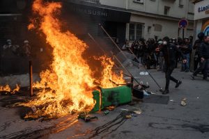 The remains of French culture, French life, dying in a street in Paris (Photo by Carl Court/Getty Images)