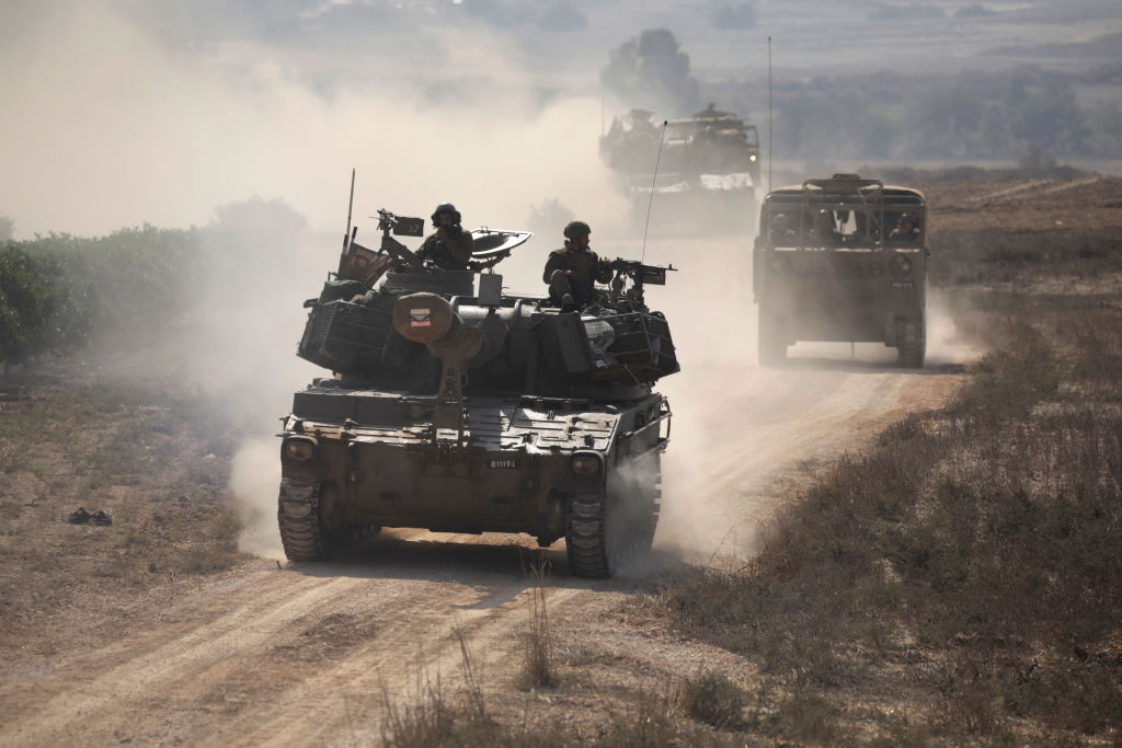 Israeli troops set off to confront the 12th SS Panzers, also known as Hamas (Photo by Amir Levy/Getty Images)