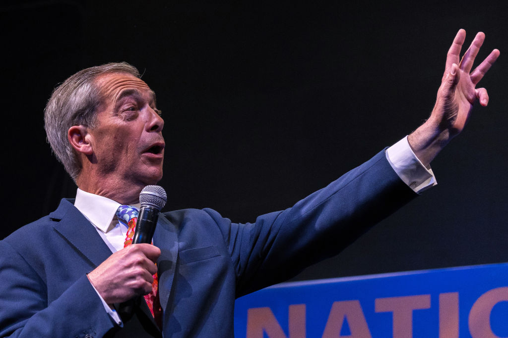 Farage gives a big thank-you wave to Tony Blair and his proportional representation (Photo by Omar Havana/Getty Images)