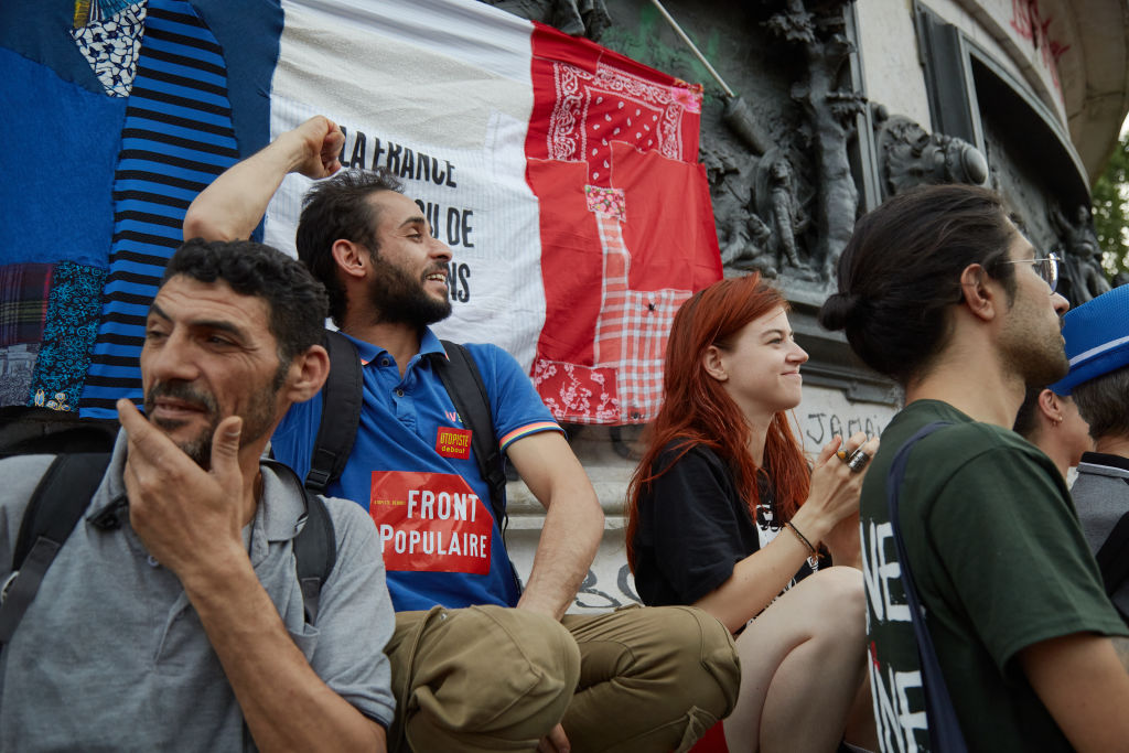 An anti-migrant electro dance song titled "Je partira pas" (I won't leave) has taken French social media by storm, despite efforts to ban it. (Photo by Pierre Crom/Getty Images)