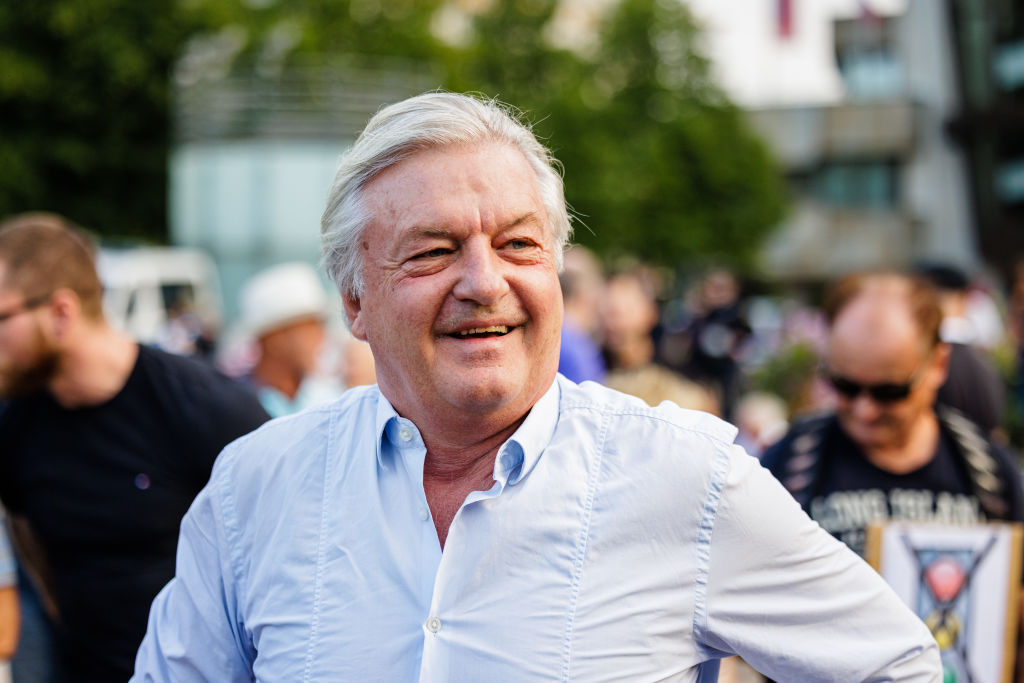 Editor Jürgen Elsässer, German officials raided his home, his office, destroyed his website, paraded him in perp walk, calling it "democracy"(Photo by Jens Schlueter/Getty Images)