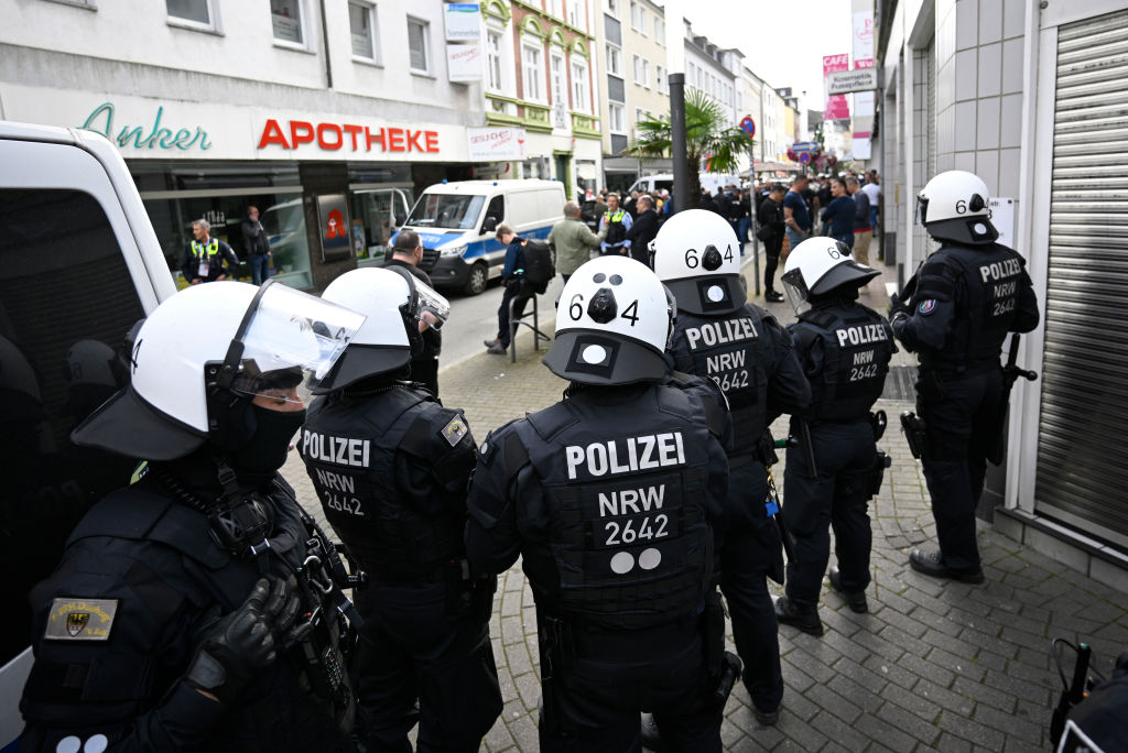 ARCHIVE IMAGE - German police forces have launched over 360 investigations into instances of suspected hate speech over the playing or singing of a German meme anthem. (Photo by Sascha Schuermann/Getty Images)