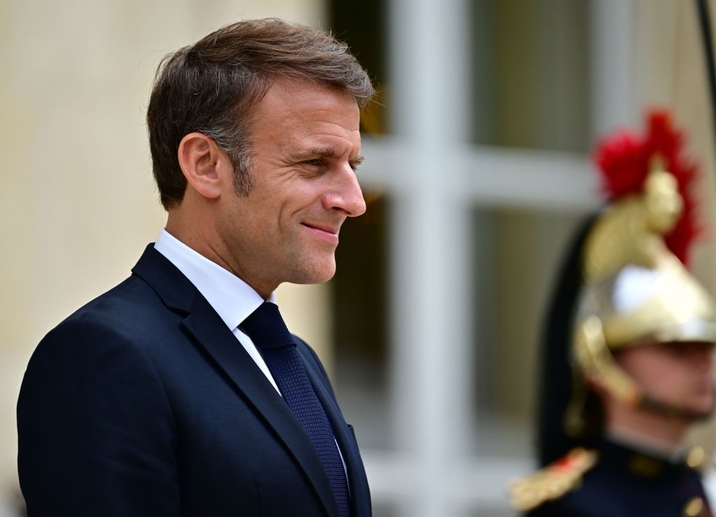 A reason to smile? Macron may have tricks ahead for both Le Pen and Mélenchon (Photo by Christian Liewig - Corbis/Corbis via Getty Images)