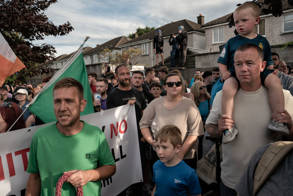 Working class people in Dublin protest against hundreds of migrants being moved into their community, but the EU will only despise them (Photo by Natalia Campos/Getty Images)