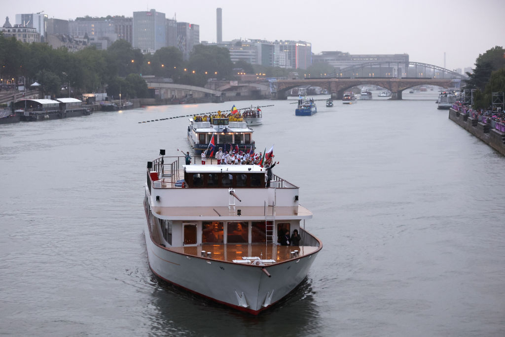 The Seine is still too dirty to swim in despite French President Emmanuel Macron's plan to reduce the amount of poop-related contaminants in the river. (Photo by Lars Baron/Getty Images)