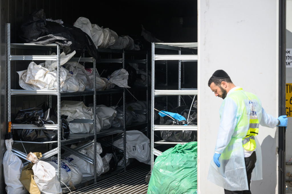Wrapped and refrigerated, how many more corpses before Lammy says Israeli defence must be totally supported? (Photo by Leon Neal/Getty Images)