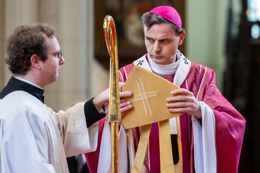 Carrying a heavy load for the Pope, Archbishop of Brussels-Malines in charge of yet another child abuse conference (Photo by Geert Vanden Wijngaert/Getty Images)