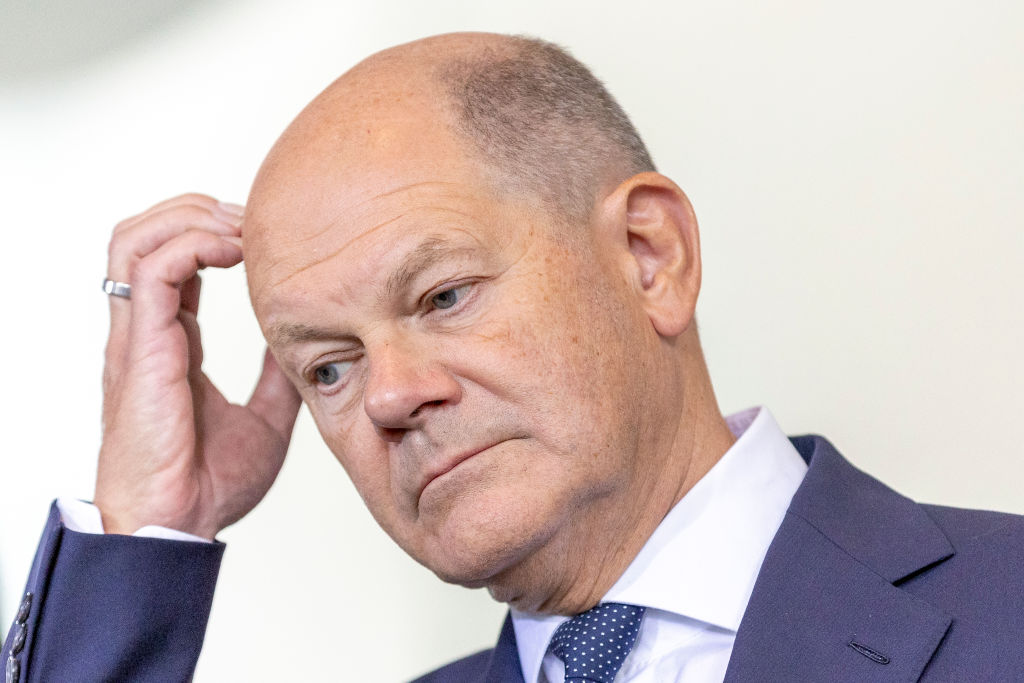 German Chancellor Scholz is fending off a revolt from within his own party over the tougher line his government recently took on migration. (Maja Hitij/Getty Images)