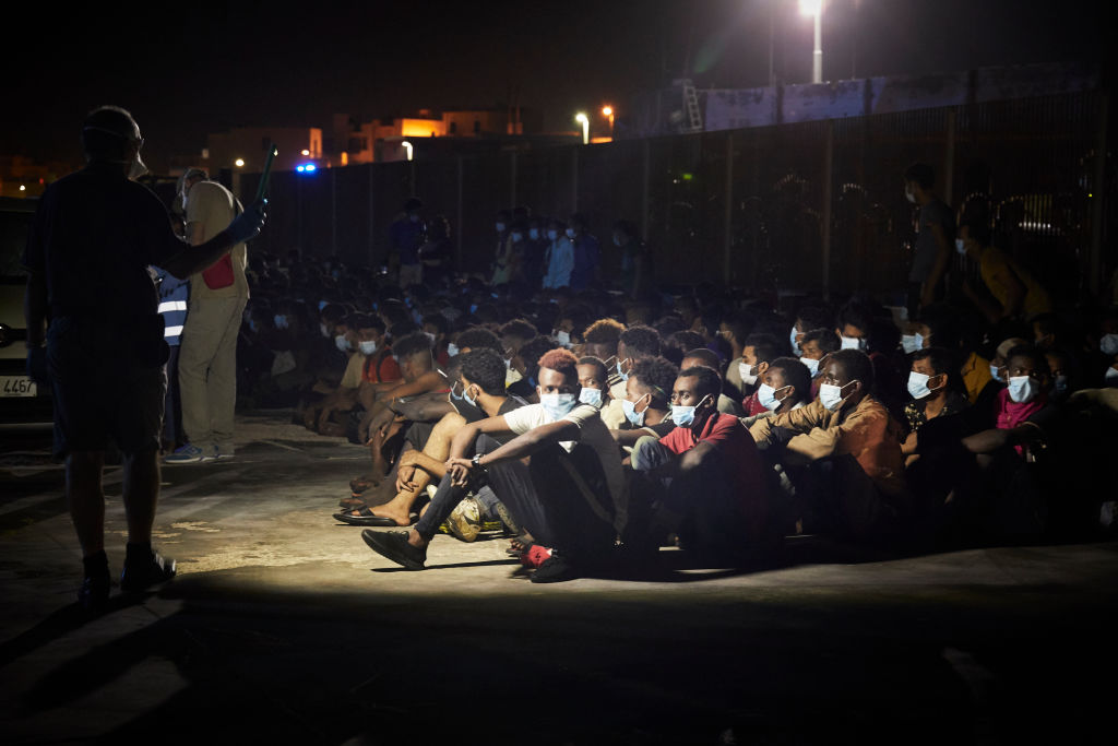 Migrants arrive in Europe. Will the illegal ones now go home if they are paid with EU millions? (Photo by Lorenzo Palizzolo/Getty Images)