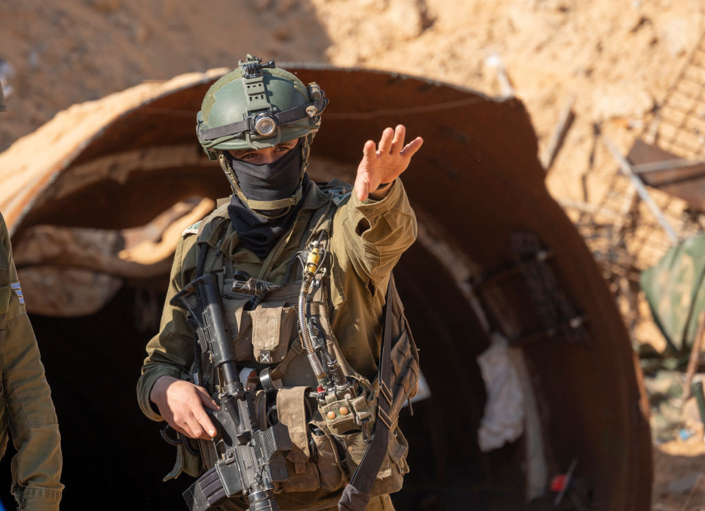 An Israeli soldier at a Hamas tunnel in Gaza (Photo by Noam Galai/Getty Images)