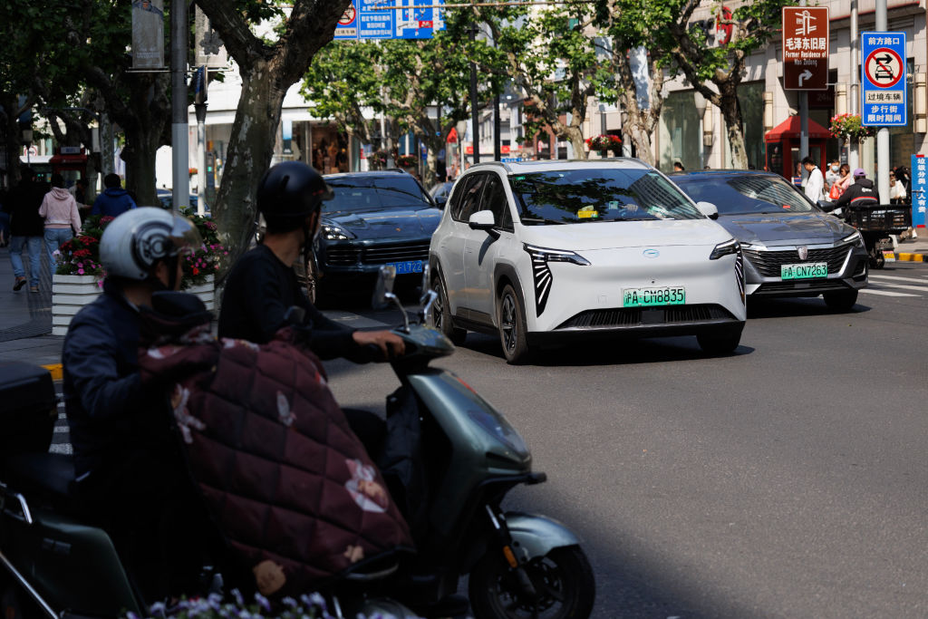 France, Greece, Italy and Poland will vote on Friday in favour of tariffs of up to 45 per cent on imports of electric vehicles (EVs) made in China, sources said, enough to push through the European Union's highest profile trade measures, risking potential retaliation from Beijing. (Photo by Hugo Hu/Getty Images)
