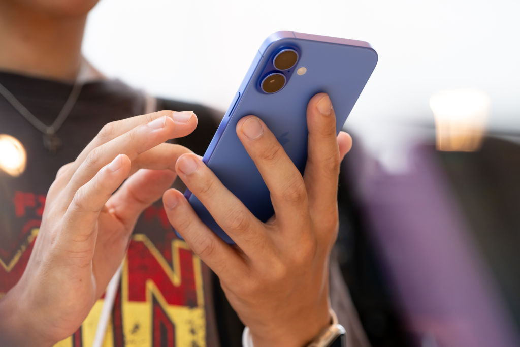 Apple will not roll out essential features of its latest series of iPhones until April of next year, the Californian tech company has confirmed. (Photo by Tomohiro Ohsumi/Getty Images)