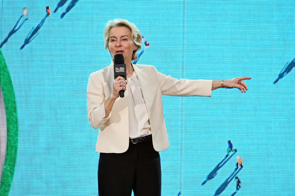 Ursula von der Leyen pretending she can point a way towards a migrant policy (Photo by Theo Wargo/Getty Images for Global Citizen)