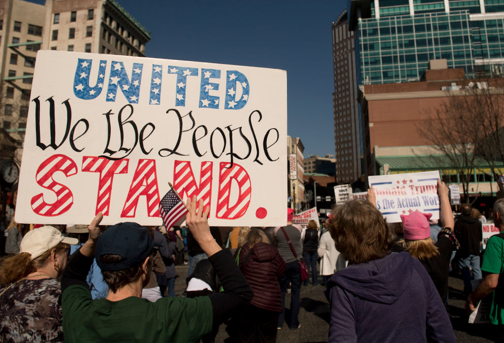 Campaigning by Democrats in the States, but does the mood travel overseas? (Photo by Jeff Swensen/Getty Images)
