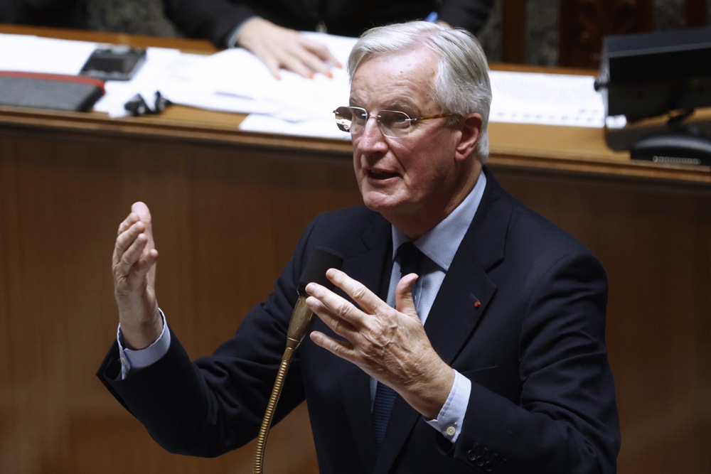 France's national budget is so strained that lawmakers are pushing a proposal to make the French work an extra seven hours each year without pay - the equivalent of one working day - to generate extra funds for state coffers. EPA-EFE/YOAN VALAT