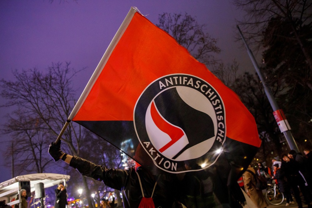 Antifascists wreak havoc in Brussels on November 14 protesting RN Jordan Bardella's book signing and attacking Vlaams Belang HQ. EPA-EFE/FLORIAN WIESER