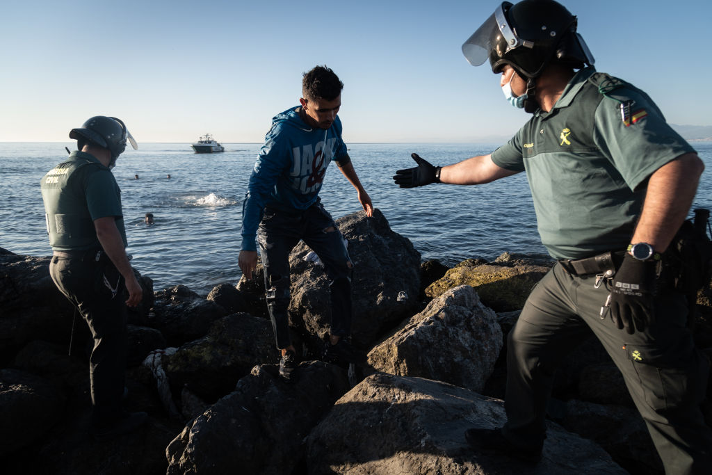 The Spanish government announced the country's is set to regularise 300,000 undocumented migrants per year through 2027. (Photo by JoanAmengual/VIEWpress/Corbis via Getty Image )