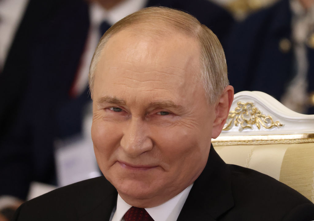 Looking pleased? Sure. But the victories of the nationalism in Austria, Czechia, Hungary, Slovakia and now Romania are caused by far more than a smirking Putin (Photo by Contributor/Getty Images)