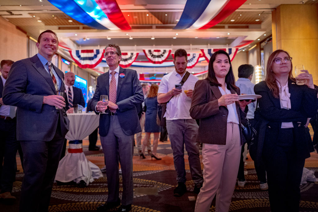 Hundreds of people, primarily local Democratic supporters and US expatriates living in Belgium, gathered last night at the Châtelain Hotel in Brussels. With their eyes fixed on screens showing the incoming results from across the Atlantic, many attendees began to leave early as initial results started to appear. (Photo by Ezra Acayan/Getty Images)