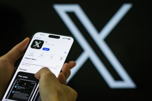 A group of legacy media outlets in France are suing Elon Musk's X over its alleged failure to obey the dictates of an EU directive as it has been transcribed into the country's law. (Photo by Cheng Xin/Getty Images)