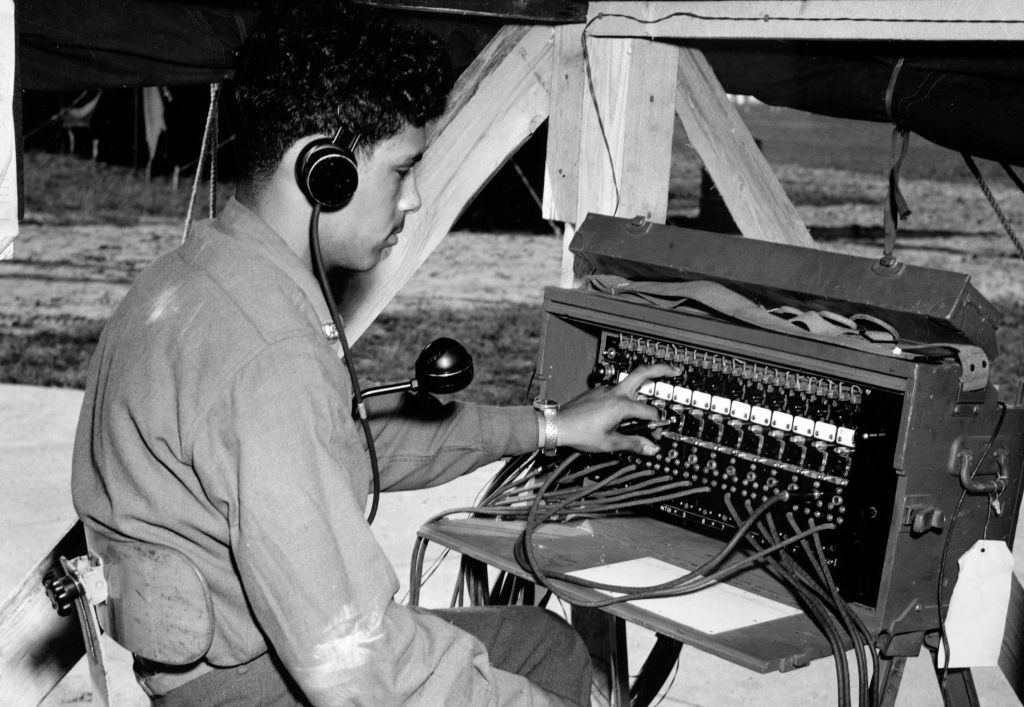 A perky start-up investor is impressed with the infrastructure for Germany's latest high speed cell service (Photo by Afro American Newspapers/Gado/Getty Images)