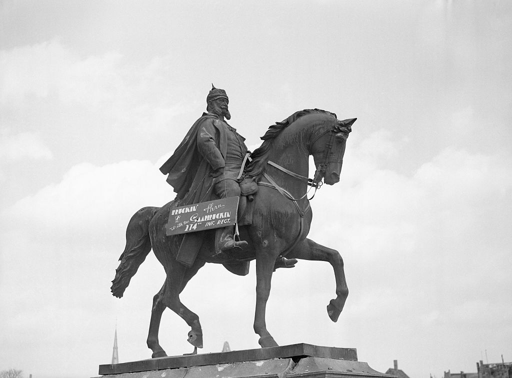March 1945, a statue of Bismarck in Saarland after the city was captured by the US Seventh Army. The proprietorial sign was hung on the Iron Chancellor by American engineers. (Bettman/Getty)