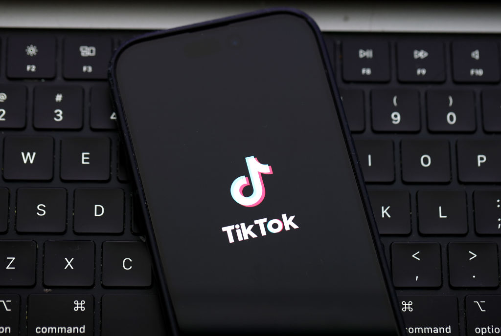 The European Commission opened formal proceedings on December 17 against social media firm TikTok over its suspected failure to limit election interference, notably in the Romanian presidential vote last month. (Photo Illustration by Justin Sullivan/Getty Images)
