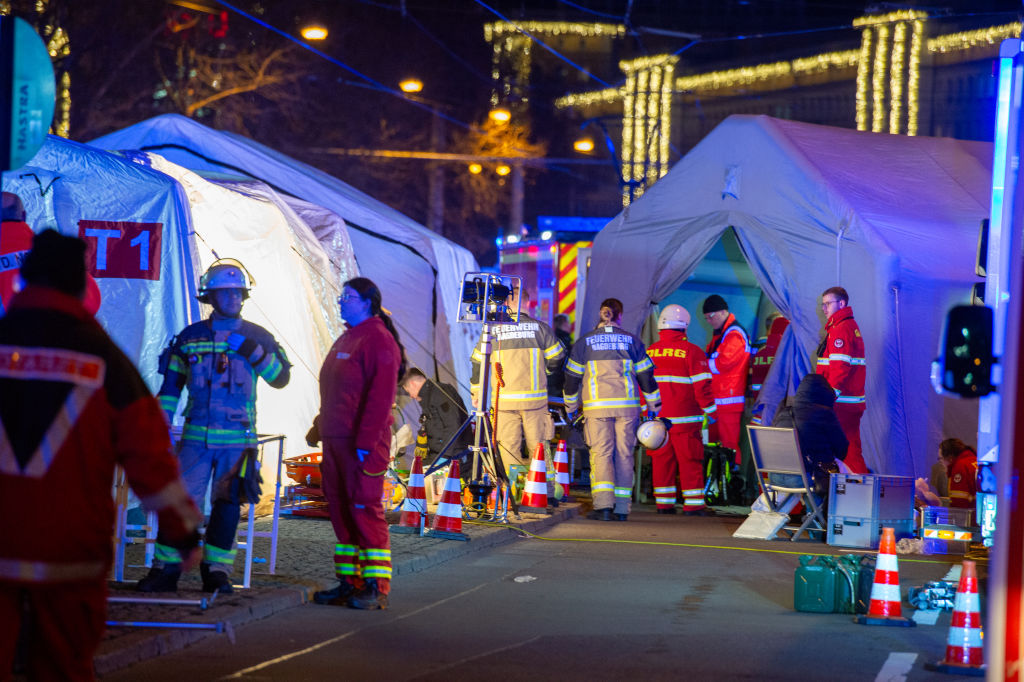 Police vans and ambulances at the annual Christmas market in Magdeburg, where at least five people died. (Craig Stennett/Getty Images)