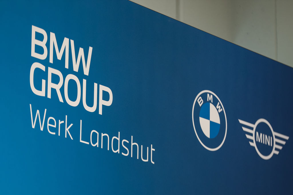 BMW expects its fourth-quarter pre-tax earnings to be significantly below last year and its full-year margin to be in the lower half of its 6-7% target, according to slides posted on the carmaker's website on January 28.  (Photo by Leonhard Simon/Getty Images)