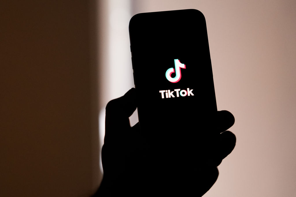 TikTok, Shein, Xiaomi and three other Chinese companies were named in a privacy complaint filed on January 16 by Austrian advocacy group Noyb, which alleged the firms were unlawfully sending European Union user data to China. (Photo Illustration by Asanka Ratnayake/Getty Images)