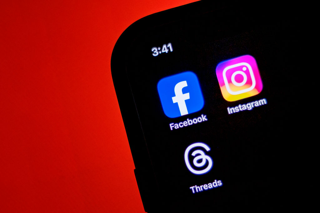The EU has threatened Meta with fines after its CEO, Mark Zuckerberg, announced that he would side with Donald Trump in the US president-elect's war on censorship at home and abroad. (Photo illustration by Ezra Acayan/Getty Images)