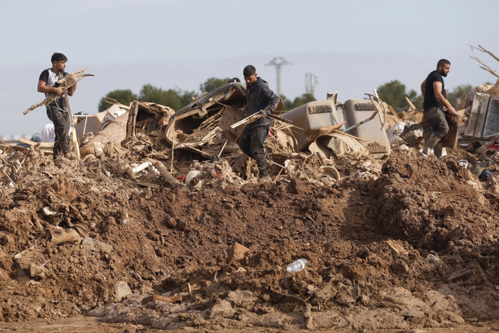 The Spanish government is set to give illegal immigrants affected by the floods in Valencia legal status. EPA-EFE/MIGUEL ANGEL POLO