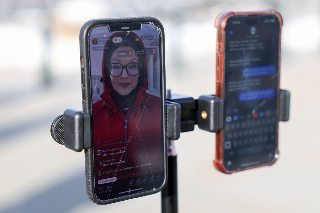 France’s digital watchdog, Viginium, warned in a report that online content creators risk being exploited for political gain as foreign actors manipulate digital platforms to influence elections citing Romanian presidential elections. (Photo by Kayla Bartkowski/Getty Images)