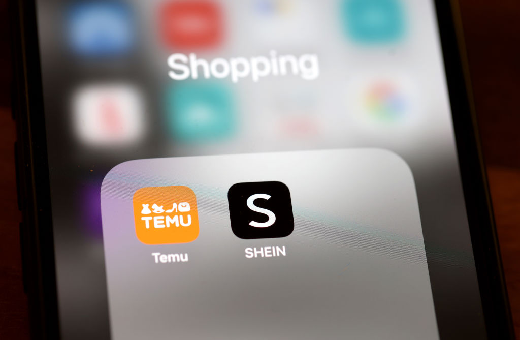 Chinese online marketplace Temu and fast-fashion retailer Shein will be liable for the sale of unsafe and dangerous products on their platforms, the European Commission said on February 5, as part of a crackdown against a flood of cheap e-commerce imports into the European Union. (Photo Illustration by Justin Sullivan/Getty Images)